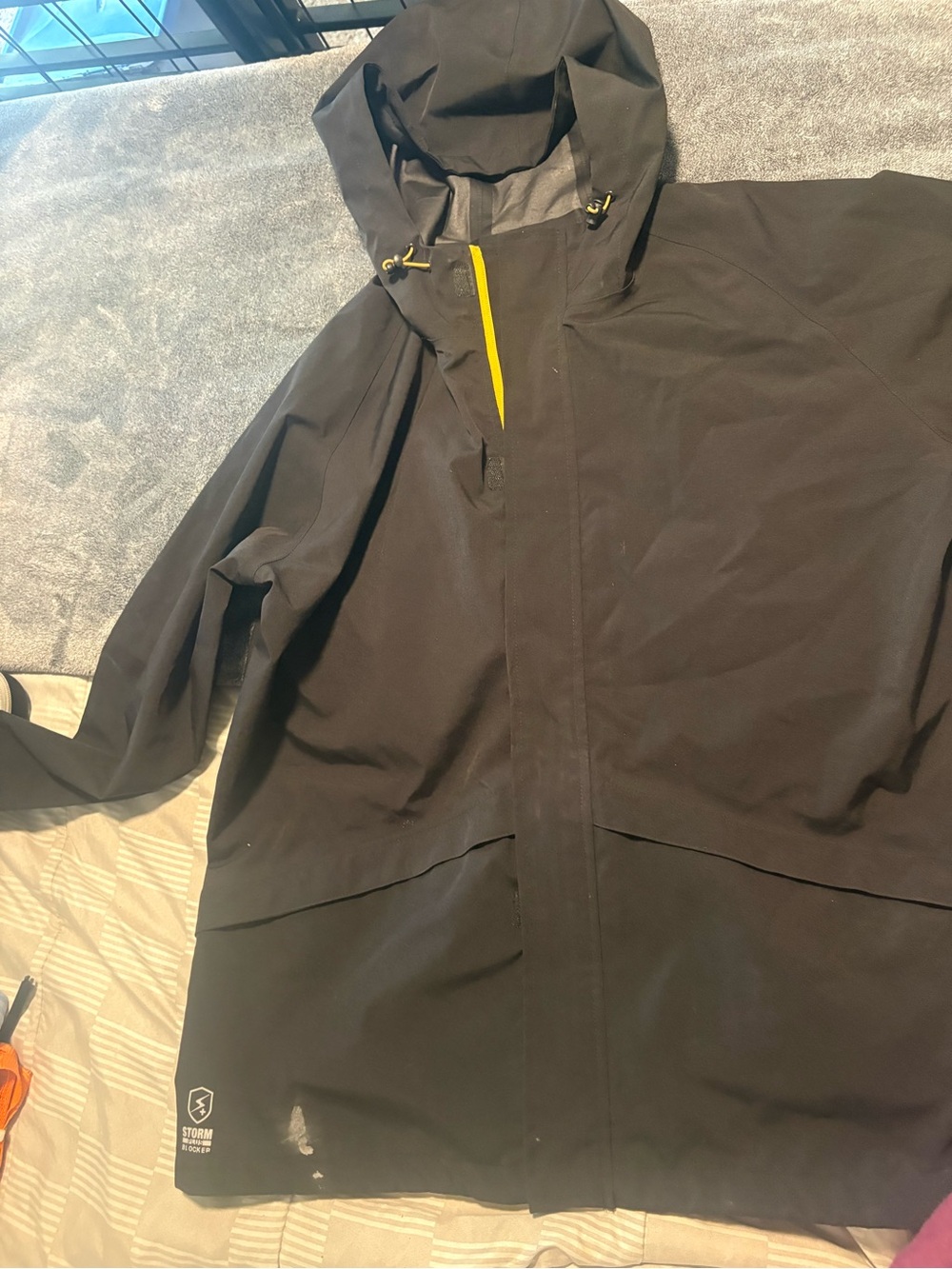 Caterpillar Black Hooded Windbreaker with Yellow Trim